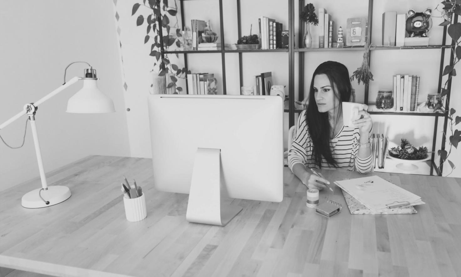 Business owner reviewing financial documents and planning business strategy